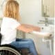 person wheelchair washing hands