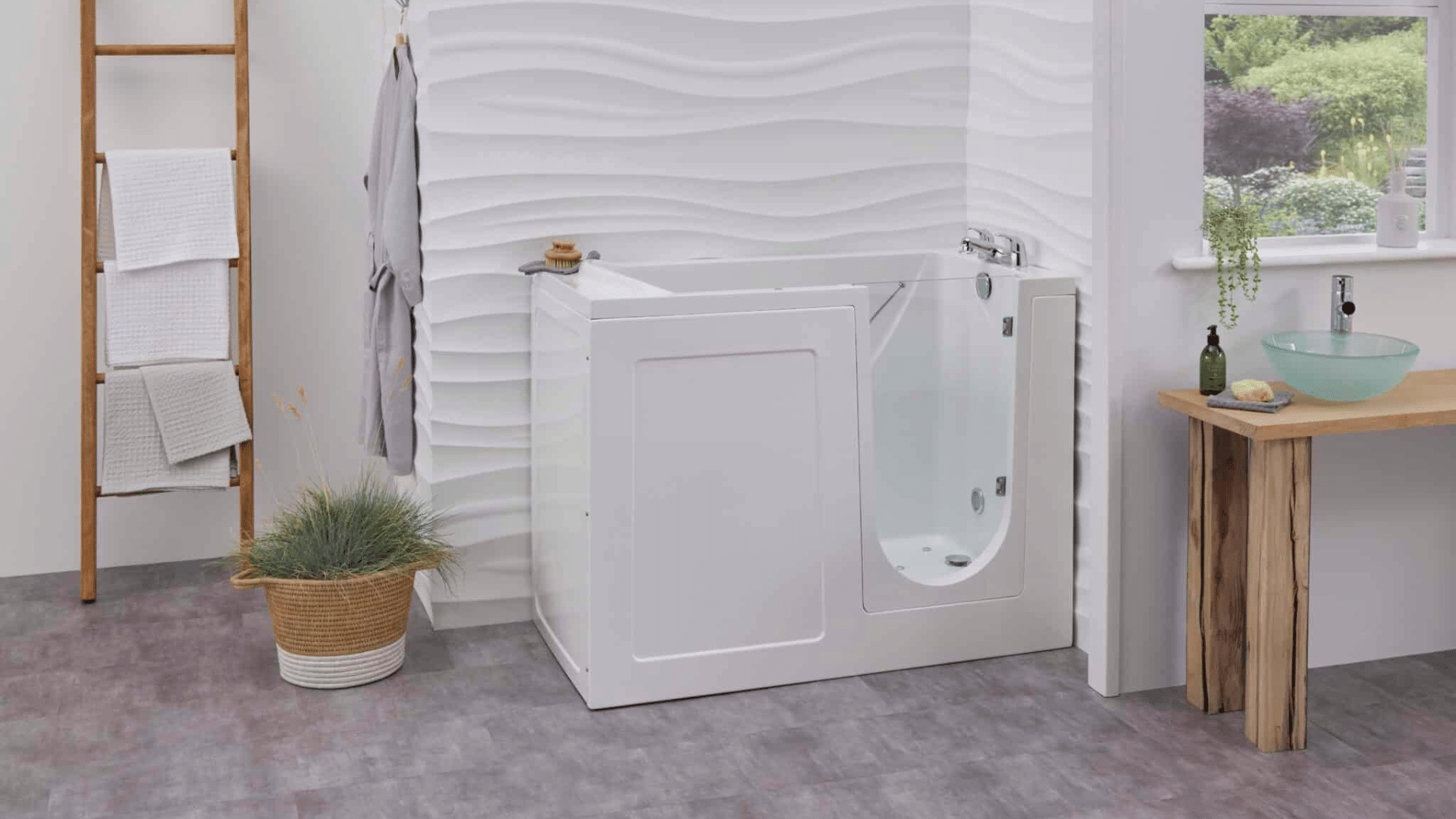 The Georgia walk-in bathtub with a glass door in a modern, brightly lit bathroom.