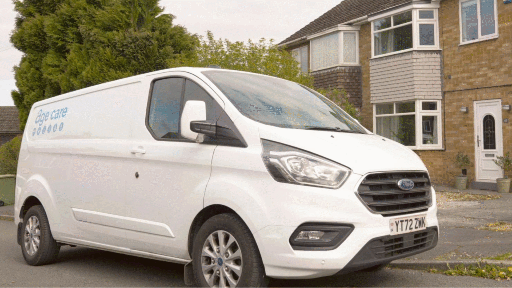 White Age Care Bathrooms service van parked outside a residential home.