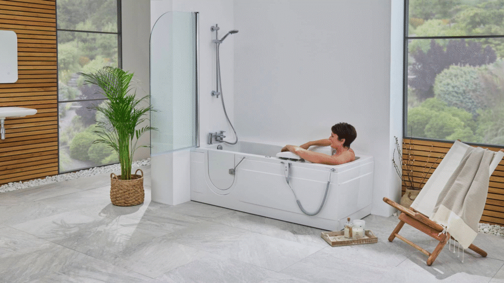 Adult relaxing in a Montana walk-in bath in a modern, bright bathroom.
