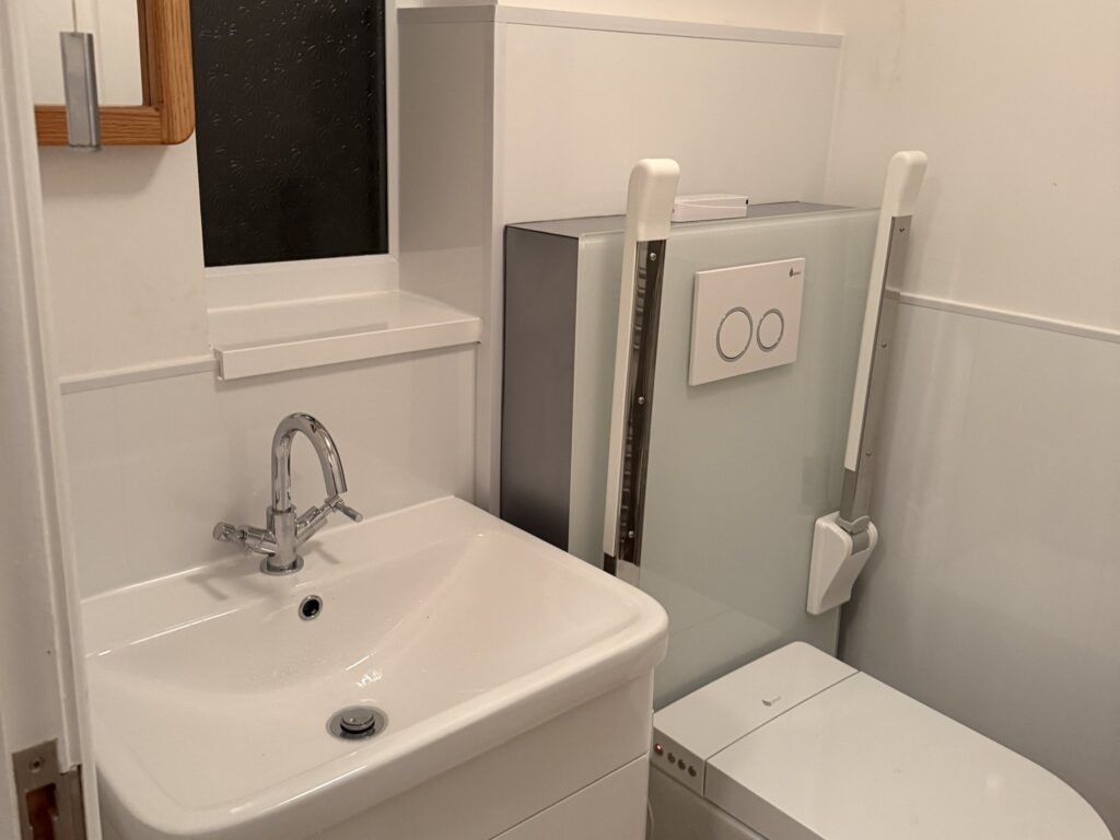 The rise and fall toilet and vanity basin in Brent's refreshed bathroom.