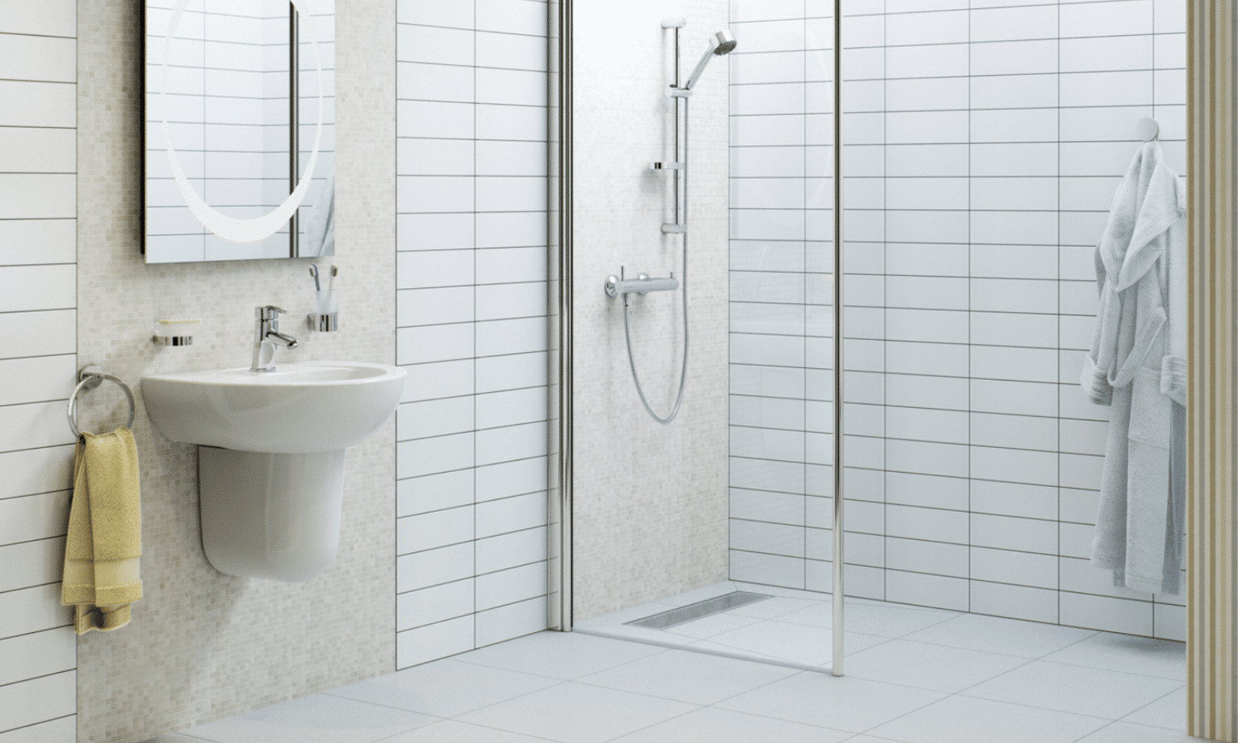 Modern mobility bathroom with white tiling, a floating sink, and a barrier-free glass shower.