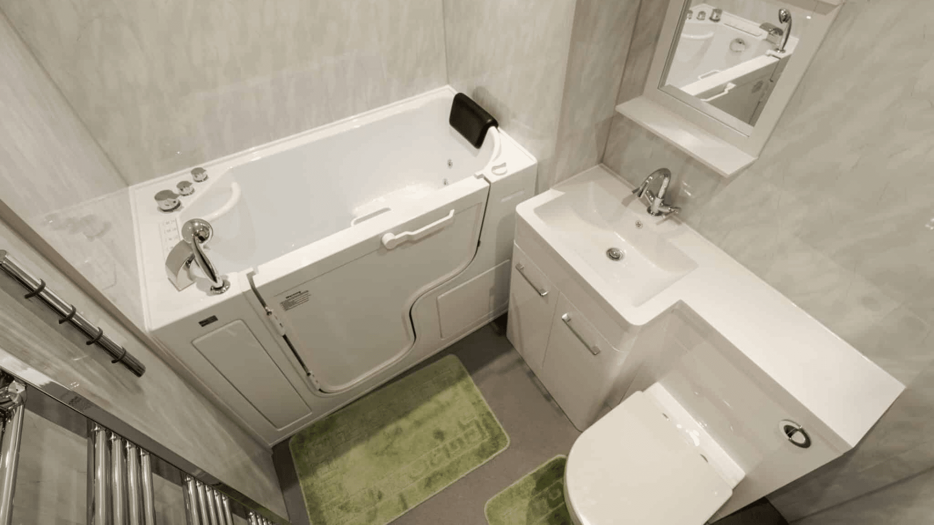 Customer walk-in bath installation by Age Care Bathrooms. Featuring a mid-length model.