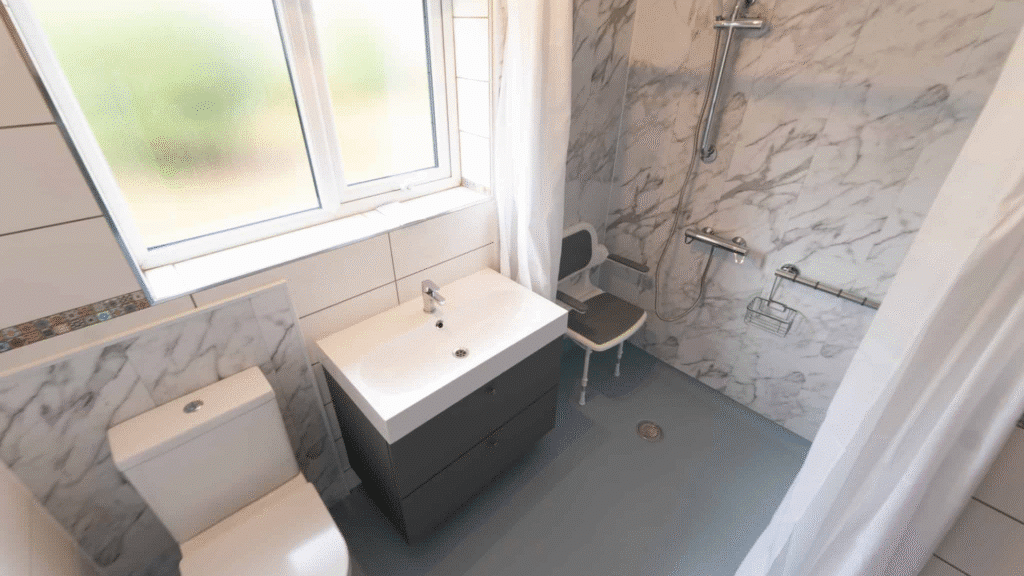 Full, small, wet room installation, designed and installed by the team at Age Care Bathrooms.