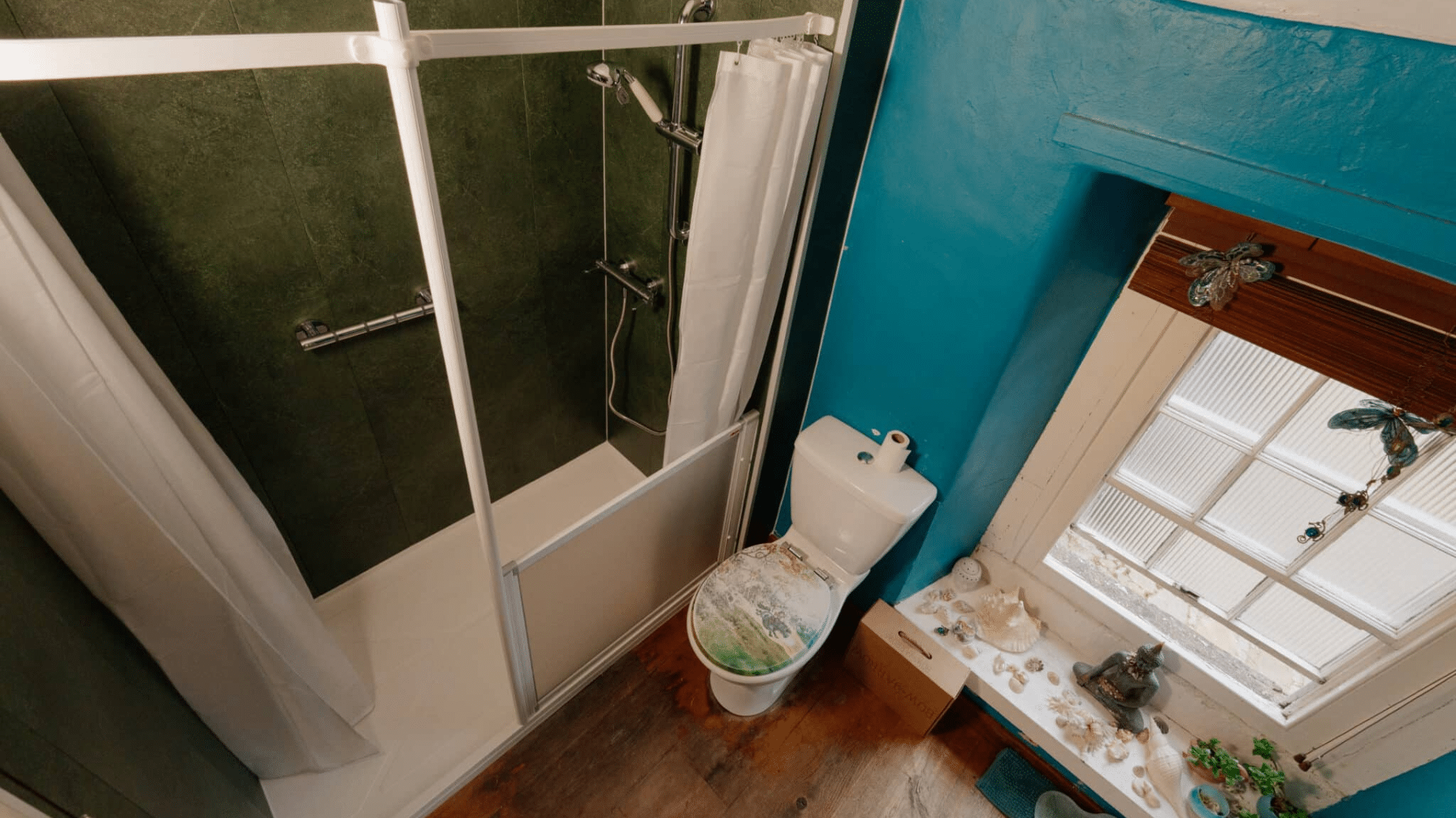 Walk-in shower with half screen installed and designed by Age Care Bathrooms.