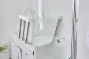 Close-up of the Easy Riser powered bath seat and backrest on stainless rails