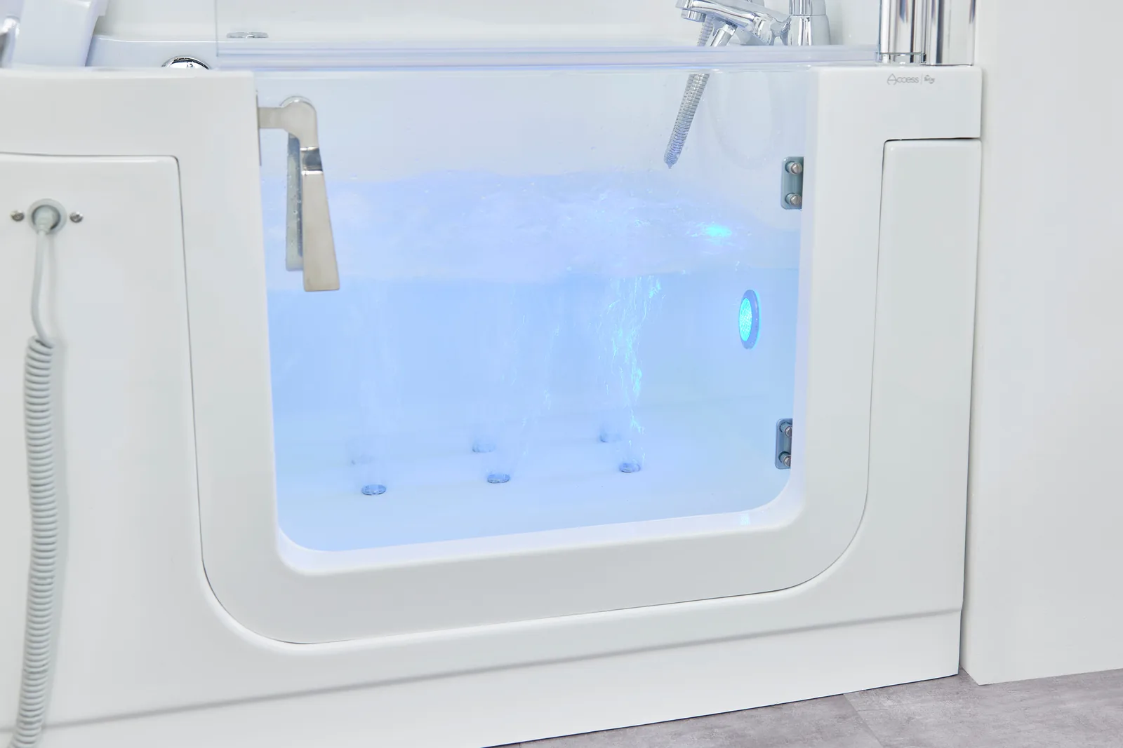 The Easy Riser air spa running with blue chromotherapy light behind the glass door