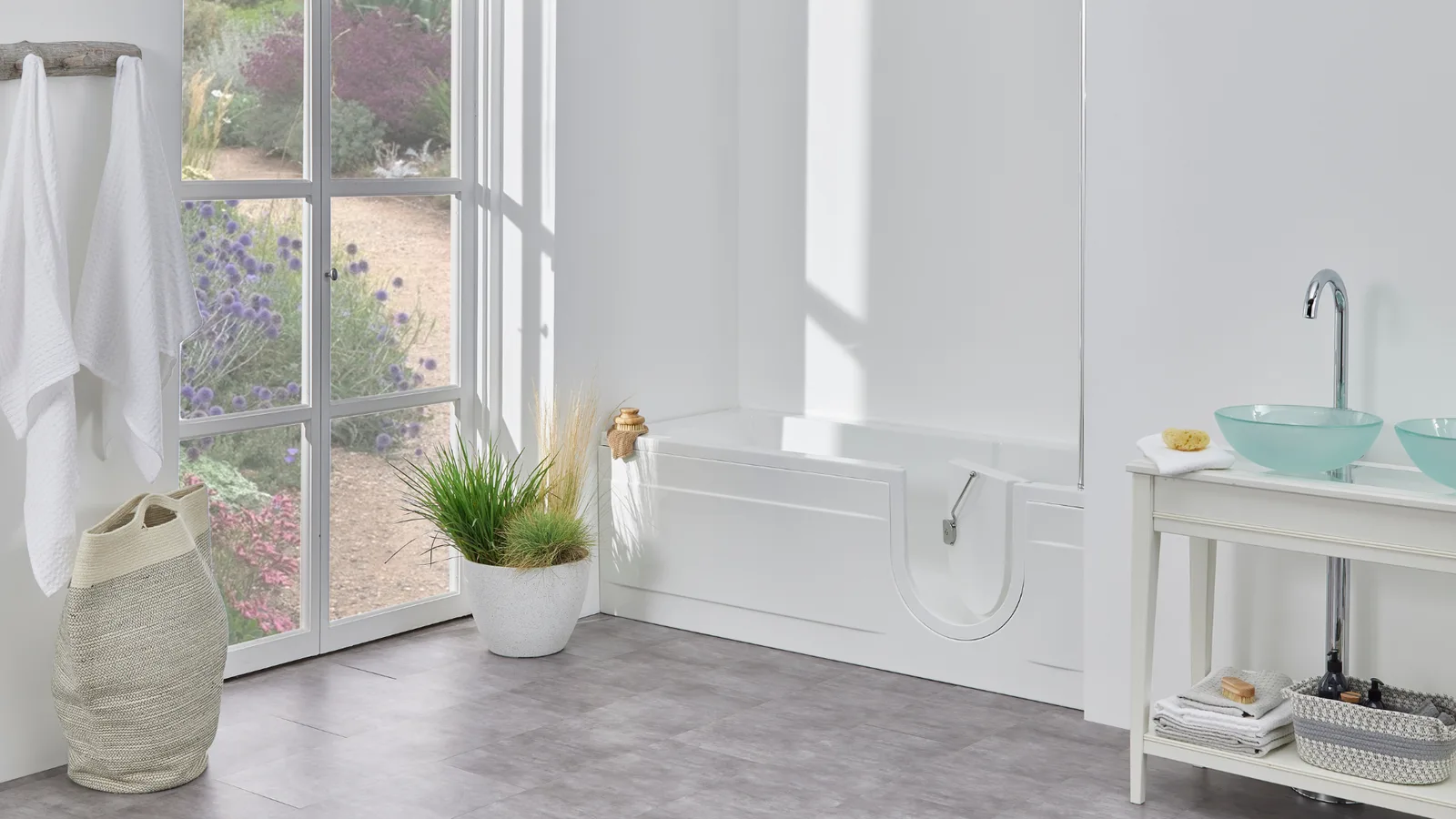 The Arizona walk-in bath with its low door open, in a bright modern bathroom