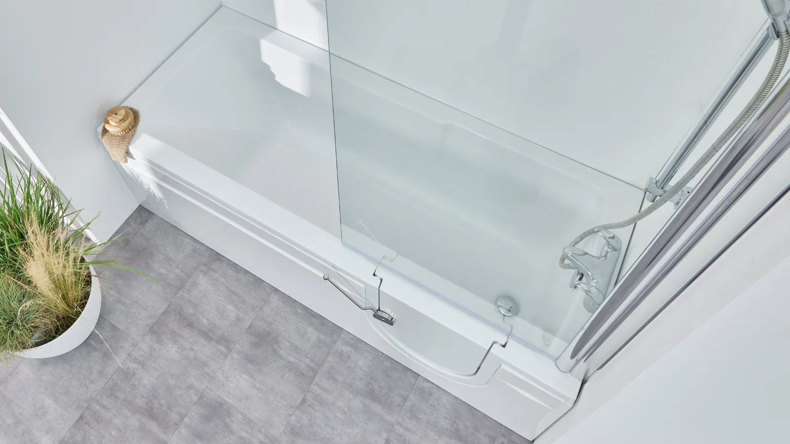 Overhead view of the Arizona walk-in bath showing its deep tub and glass screen