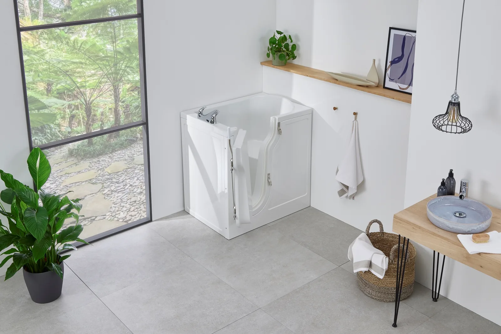 Front view of the Vermont compact walk-in bath in a bright bathroom with door open