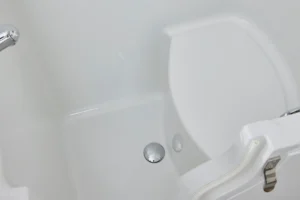 Close-up of the Vermont walk-in bath's built-in seat and door