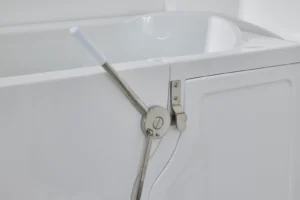 Close-up of the Vermont walk-in bath's door and lock system.
