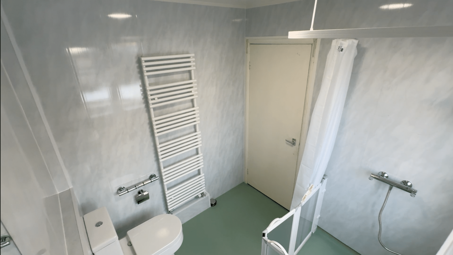 Wet room with shower screen, designed and installed by the team at Age Care Bathrooms.