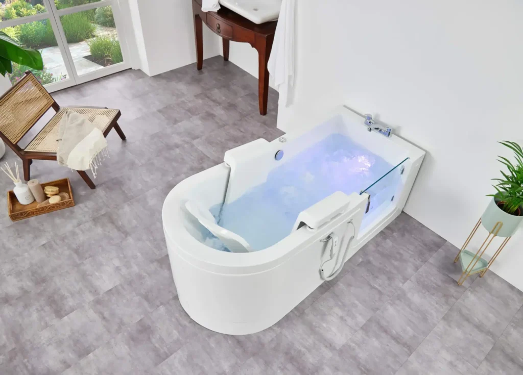 Angled view of the Easy Riser walk-in bath in a bright bathroom