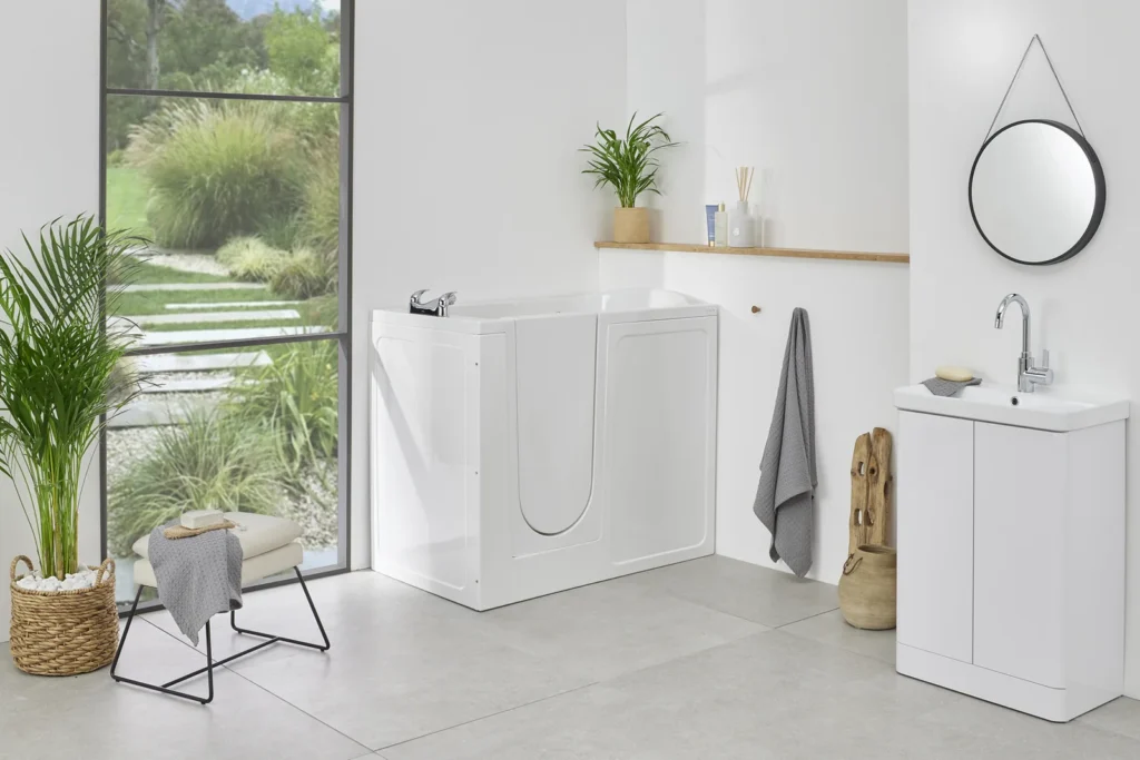 The Oregon walk-in bath with the door closed, in a bright modern bathroom