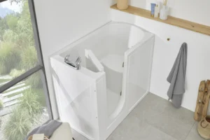 The Oregon walk-in bath with its inward-opening door open, in a bright bathroom