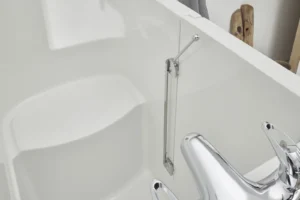 Close-up of the Oregon walk-in bath's built-in seat and door lock