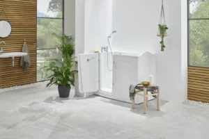 The Tennessee walk-in bath with its outward door open, in a bright bathroom