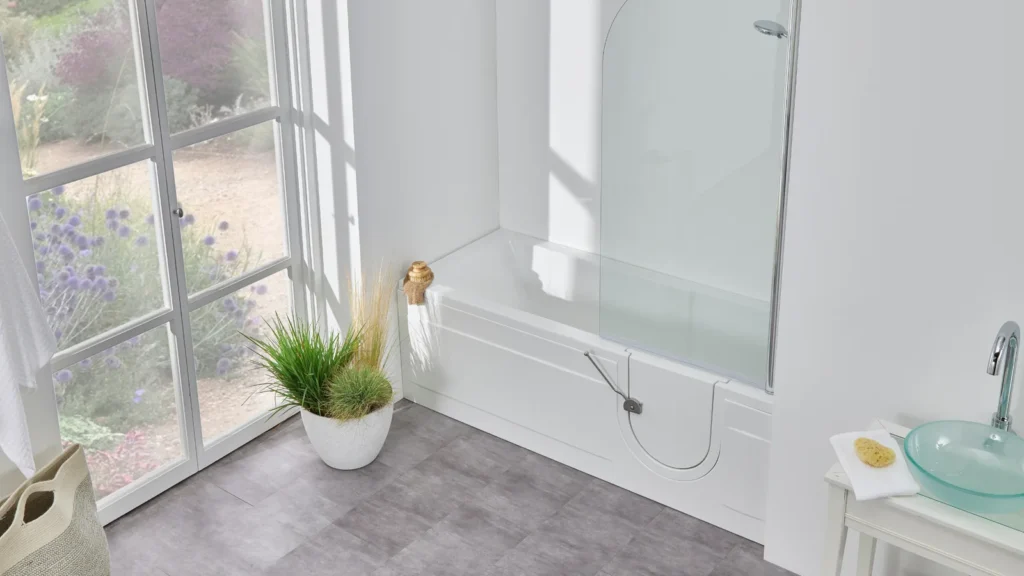 Angled view of the Arizona walk-in bath with its curved glass shower screen