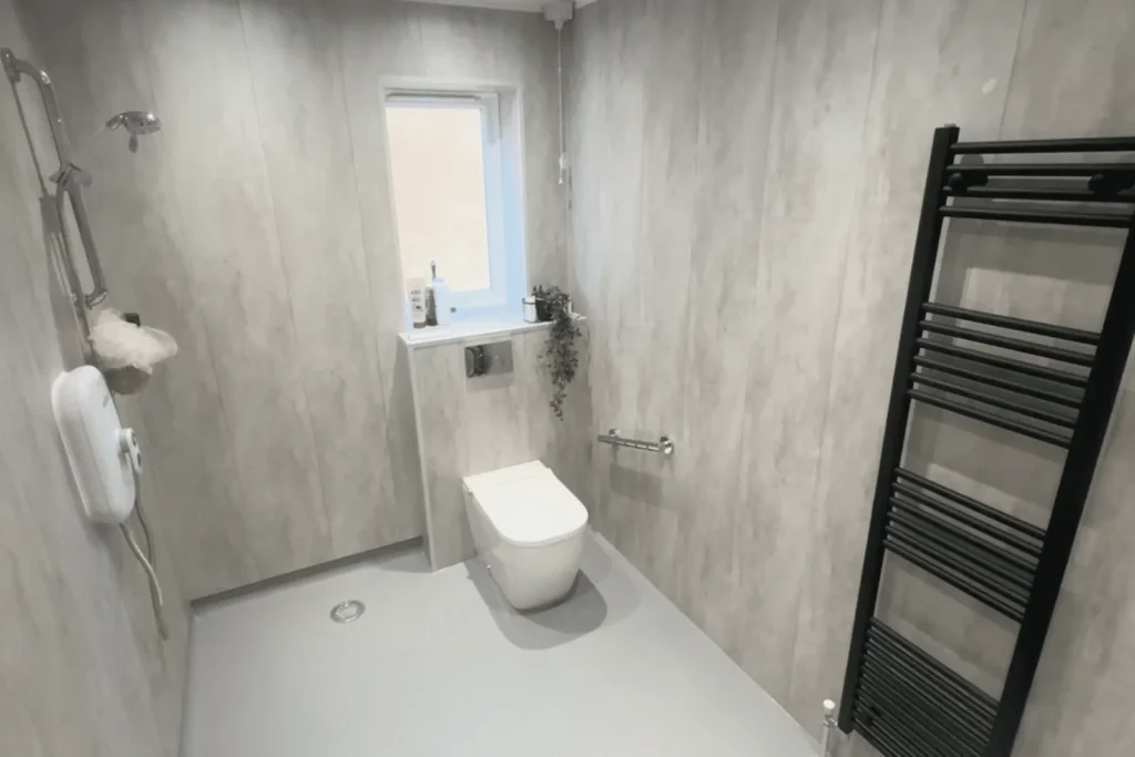 Linda's spacious wheelchair-friendly wet room with a level-access shower and toilet