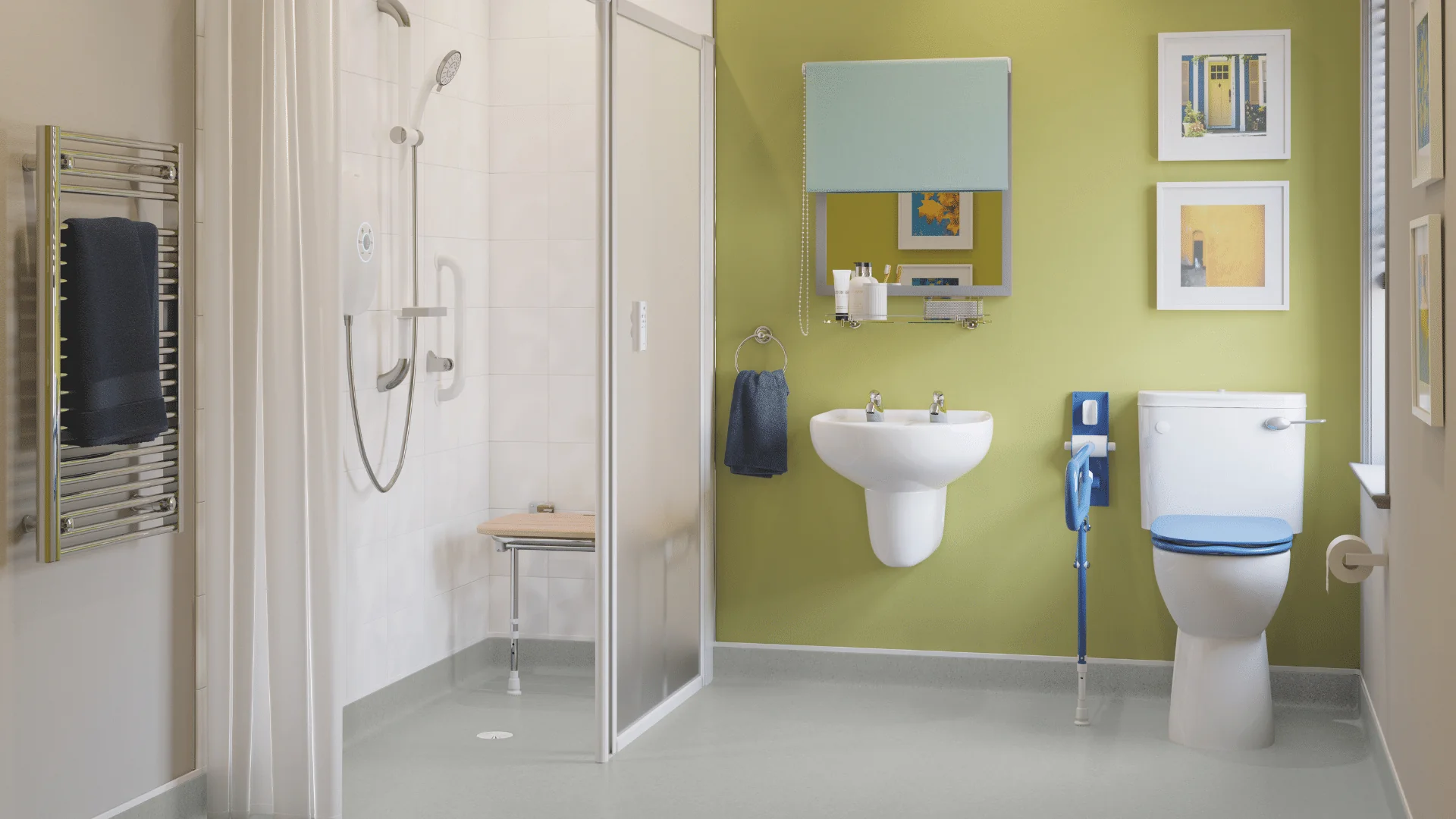 Mobility bathroom with blue grab rails, a showering area, a waterproofed floor, and a wall-hung basin.