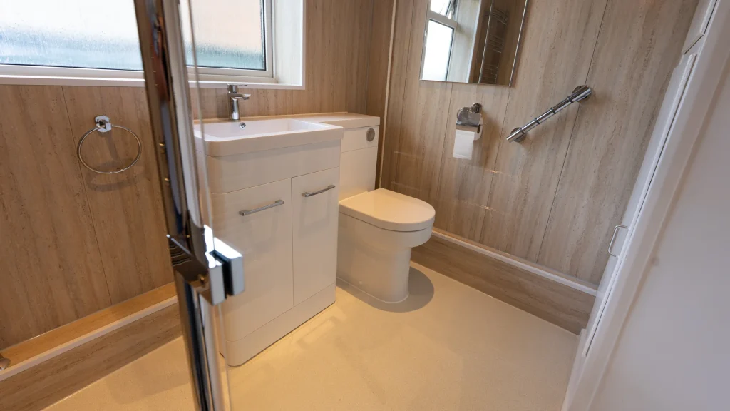 Photo through Tom's new shower screen with the basin and toilet in the other corner.