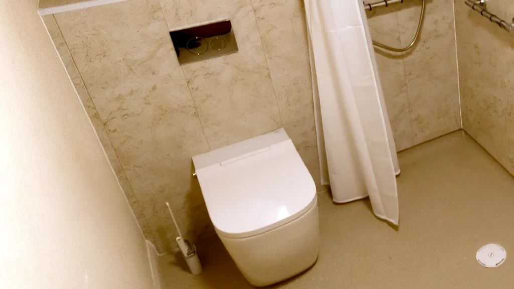IMEX Essence smart toilet with a concealed cistern in Malcom's level-access bathroom