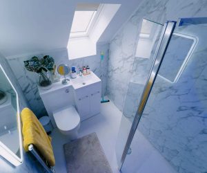 Seamless safety and style. We gave Sophie a full wet room installation, removing her challenging high-step shower. The result is a stunning, level-access space that fully supports her independent bathing.